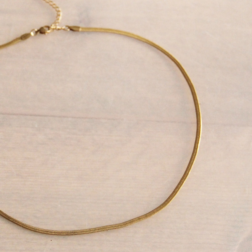 Platte schakelketting | goud