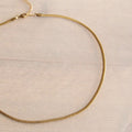 Platte schakelketting | goud