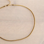 Platte schakelketting | goud