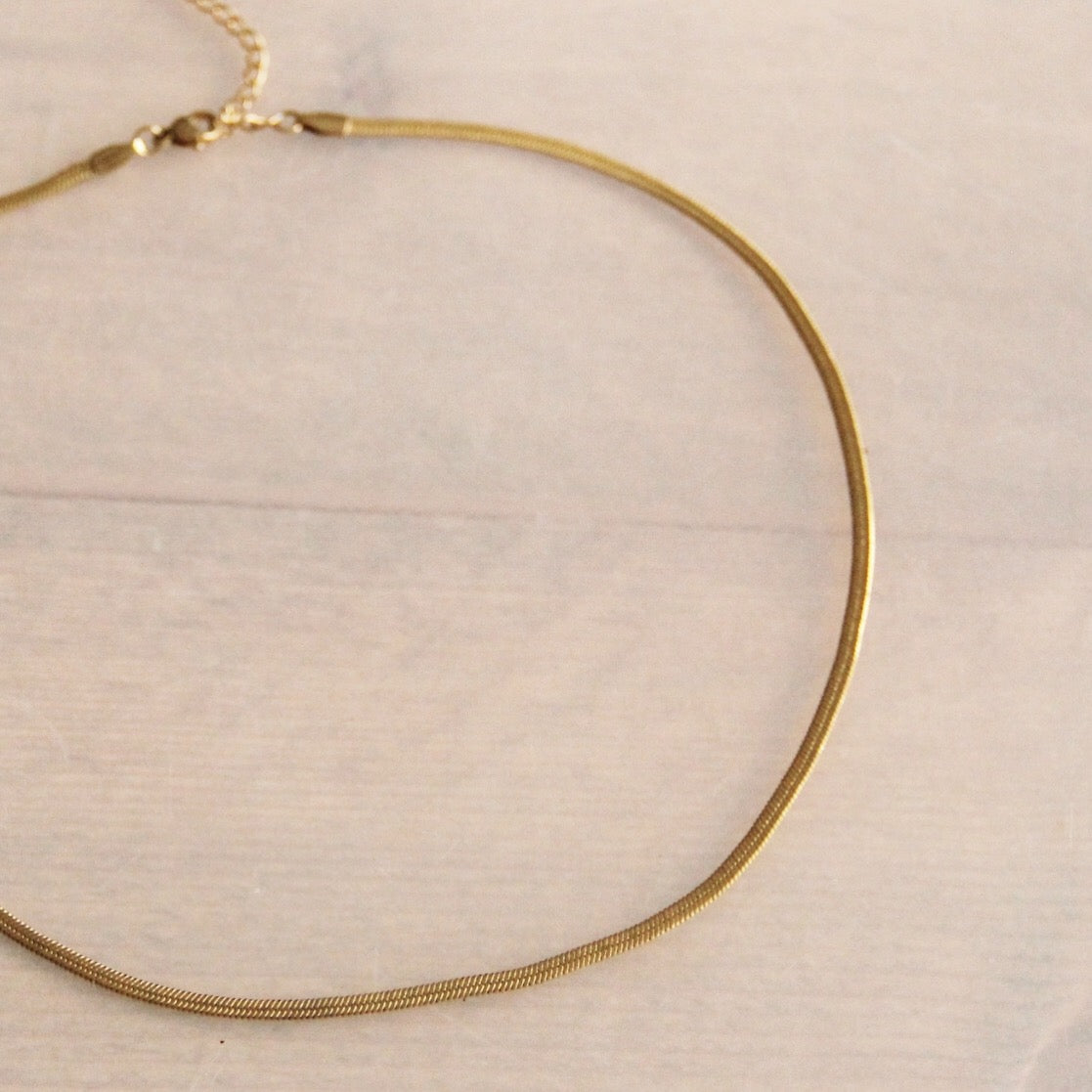 Platte schakelketting | goud